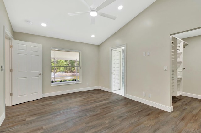 17393 84th Ct N, Loxahatchee, FL 33470 - empty room featuring ceiling fan, wood finished floors, lofted ceiling, baseboards, and a smoke detector