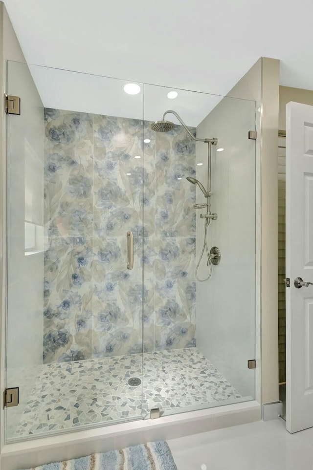 bathroom with a stall shower