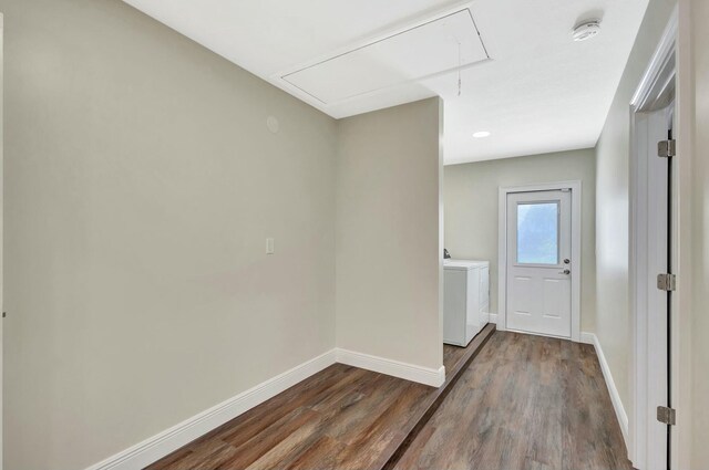 17393 84th Ct N, Loxahatchee, FL 33470 - interior space featuring attic access, baseboards, dark wood-type flooring, and washer / dryer