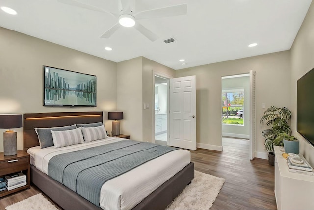 17393 84th Ct N, Loxahatchee, FL 33470 - bedroom with wood finished floors, baseboards, ceiling fan, and recessed lighting