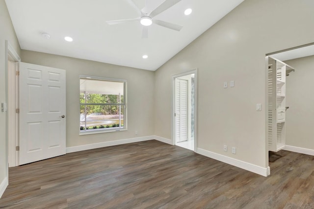 foyer with baseboards, lofted ceiling, recessed lighting, wood finished floors, and a ceiling fan