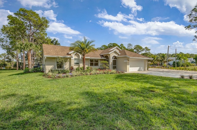 view of front of house featuring stucco siding, a front lawn, concrete driveway, and a garage