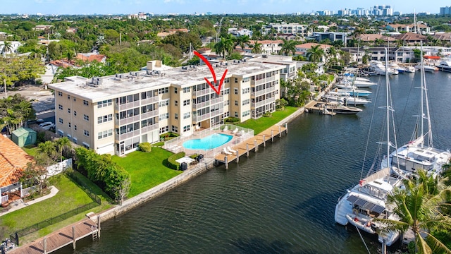 birds eye view of property with a water view