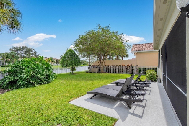 view of yard featuring a patio area and a fenced backyard