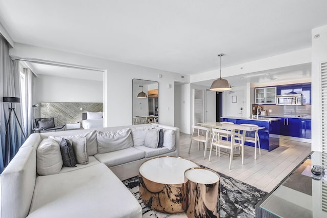 living room featuring light wood-style floors