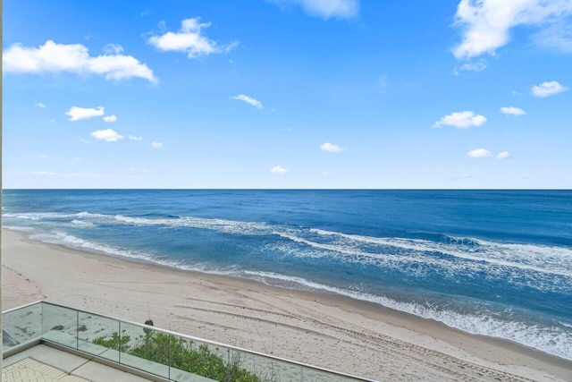 property view of water featuring a beach view