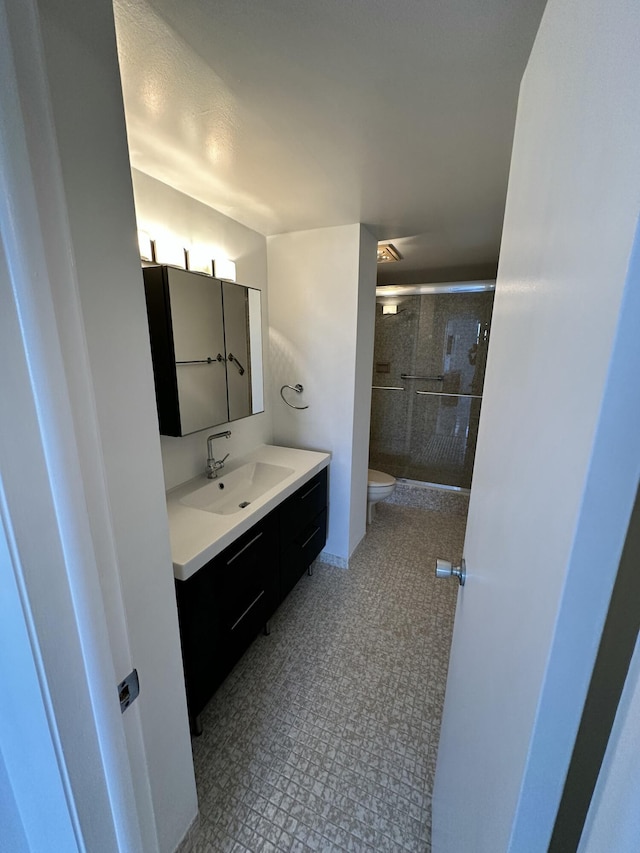 3850 Washington St Unit 510, Hollywood, FL 33021 - full bathroom with toilet, a stall shower, and vanity
