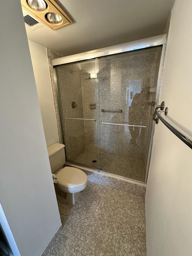 3850 Washington St Unit 510, Hollywood, FL 33021 - full bathroom with tile patterned flooring, visible vents, a stall shower, and toilet