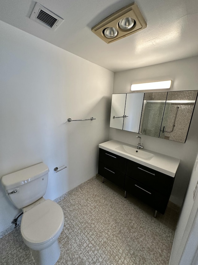 3850 Washington St Unit 510, Hollywood, FL 33021 - full bath featuring toilet, vanity, visible vents, and a stall shower