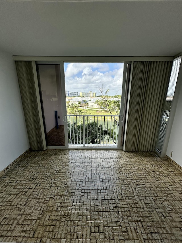 3850 Washington St Unit 510, Hollywood, FL 33021 - empty room with brick floor