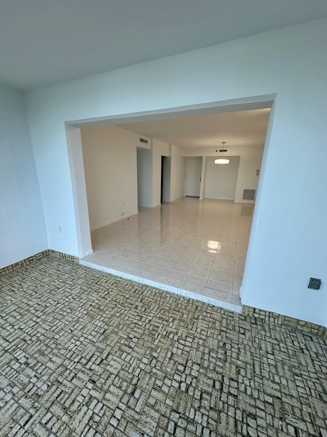 3850 Washington St Unit 510, Hollywood, FL 33021 - spare room with light tile patterned floors and visible vents