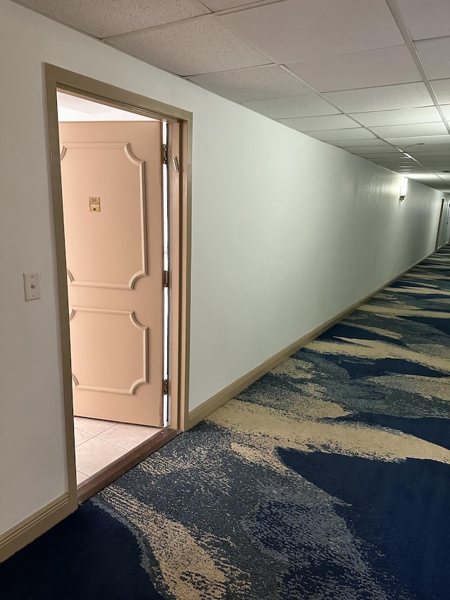 3850 Washington St Unit 510, Hollywood, FL 33021 - hall with carpet floors, baseboards, and a drop ceiling