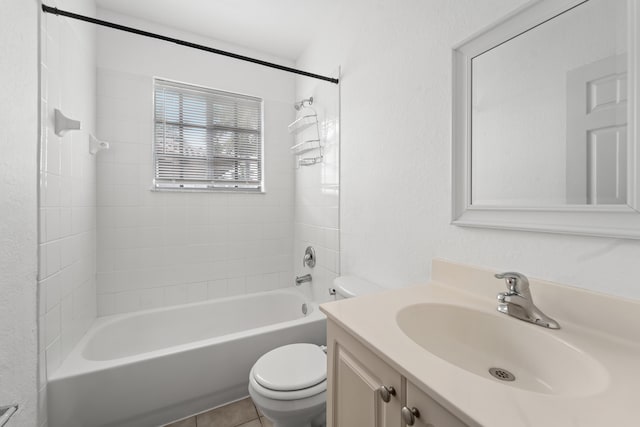 bathroom featuring tile patterned floors, vanity, toilet, and shower / bath combination