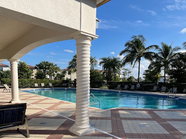 community pool featuring a patio