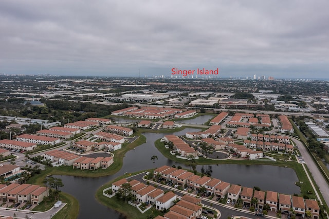 bird's eye view with a residential view and a water view