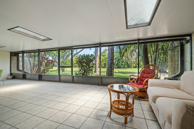 sunroom / solarium featuring a skylight