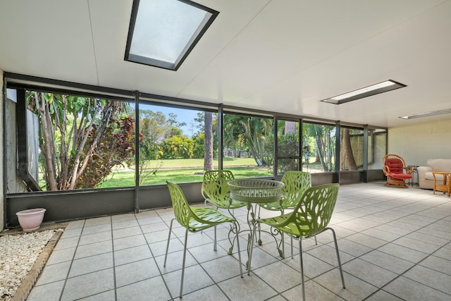 sunroom featuring a skylight