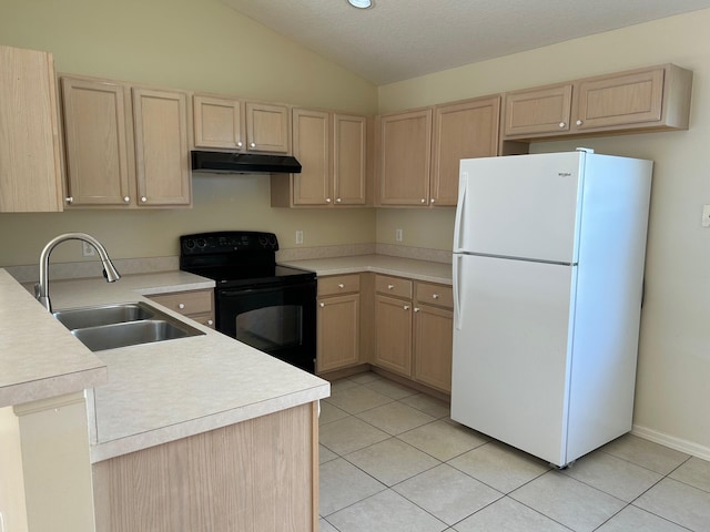 kitchen featuring under cabinet range hood, light brown cabinets, black range with electric cooktop, and freestanding refrigerator