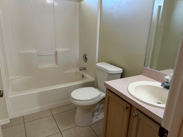 bathroom with toilet,  shower combination, vanity, and tile patterned flooring