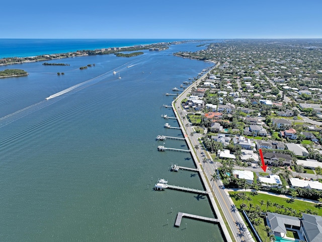 115 Elwa Pl, West Palm Beach, FL 33405 - aerial perspective of suburban area featuring a nearby body of water