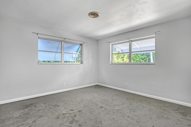 115 Elwa Pl, West Palm Beach, FL 33405 - carpeted spare room with baseboards