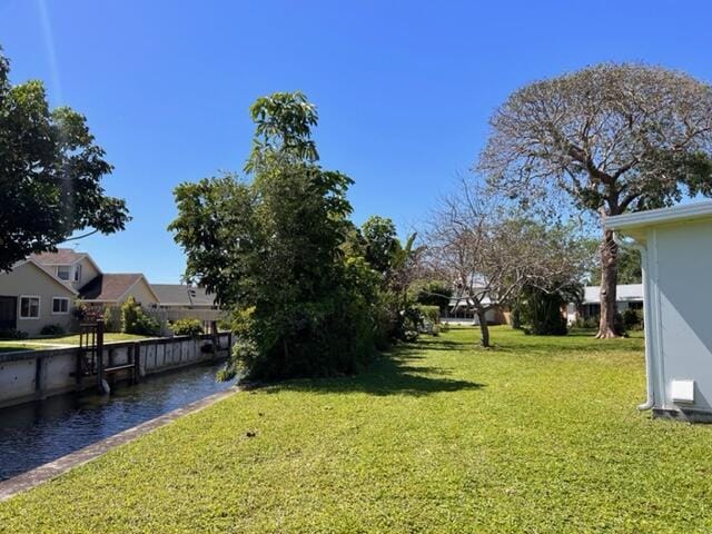 view of yard with a water view