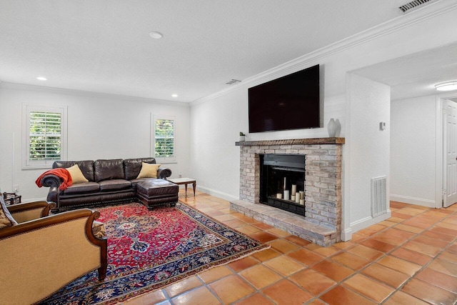 living area featuring a wealth of natural light, visible vents, a fireplace, and ornamental molding