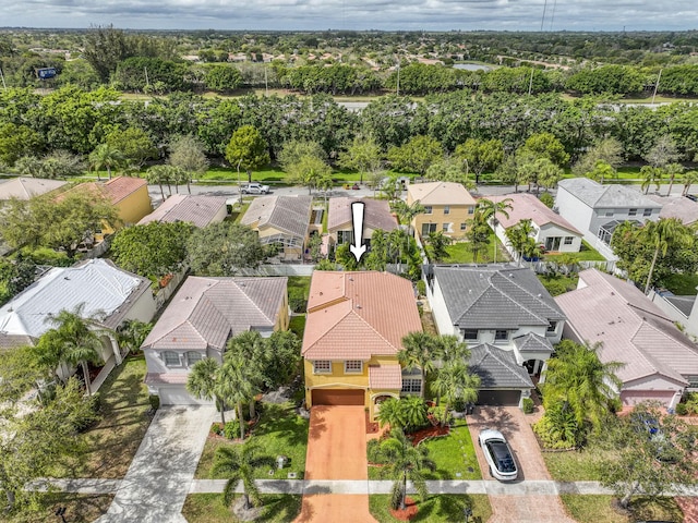 birds eye view of property with a residential view