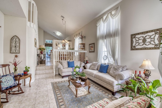 living room with light tile patterned floors and high vaulted ceiling