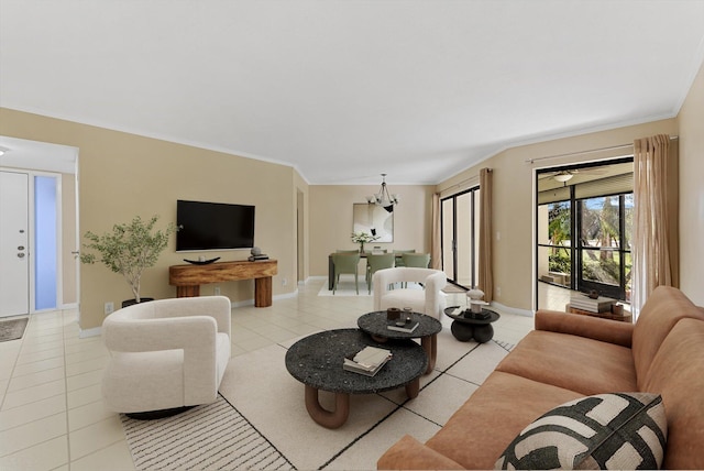 living area with light tile patterned floors, baseboards, and ornamental molding