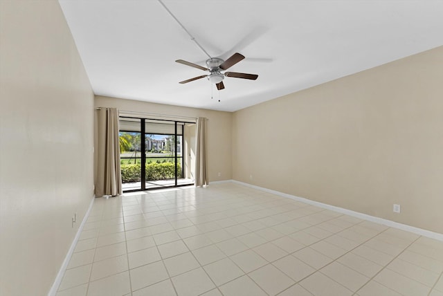 5651 Camino Del Sol Unit 103, Boca Raton, FL 33433 - spare room with a ceiling fan and baseboards
