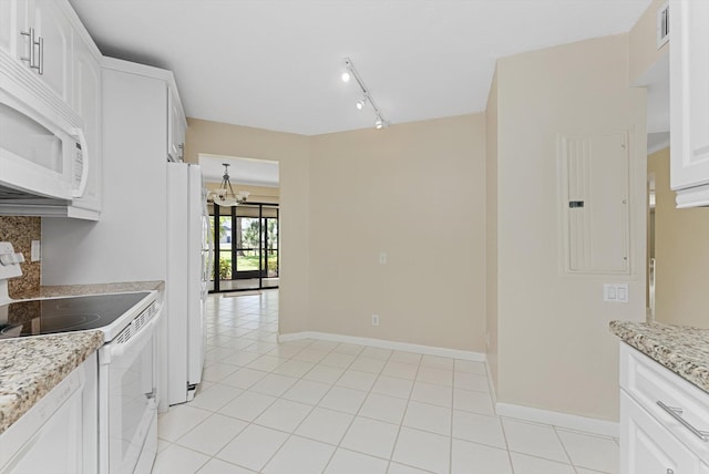 kitchen with white appliances, light tile patterned floors, visible vents, white cabinetry, and backsplash