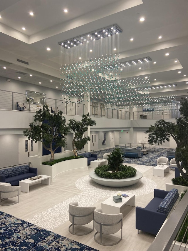 7185 Huntington Ln Unit 405, Delray Beach, FL 33446 - community lobby with recessed lighting and a towering ceiling