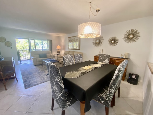 dining space with light tile patterned floors