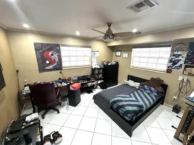 bedroom with tile patterned floors, visible vents, ornamental molding, a ceiling fan, and recessed lighting