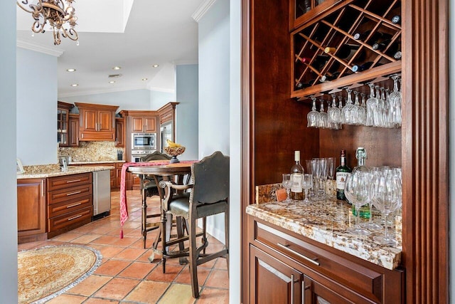 2161 NW 59th St, Boca Raton, FL 33496 - bar featuring stainless steel microwave, a dry bar, lofted ceiling, ornamental molding, and decorative backsplash