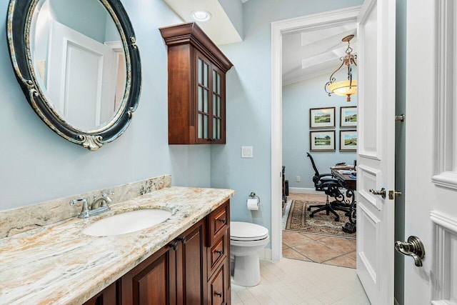 2161 NW 59th St, Boca Raton, FL 33496 - bathroom with toilet, crown molding, tile patterned flooring, baseboards, and vanity