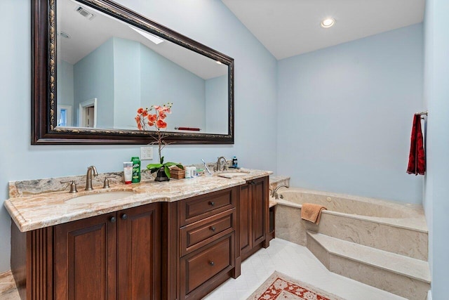 2161 NW 59th St, Boca Raton, FL 33496 - bathroom featuring double vanity, visible vents, a garden tub, and a sink