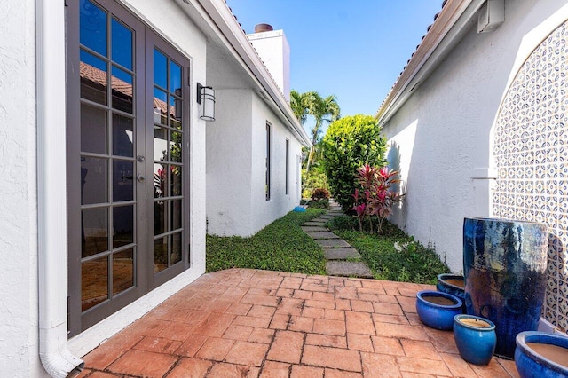 2161 NW 59th St, Boca Raton, FL 33496 - view of patio featuring french doors