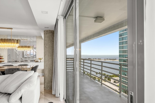 balcony featuring a water view