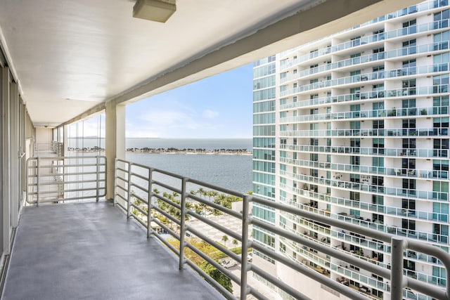 balcony featuring a water view