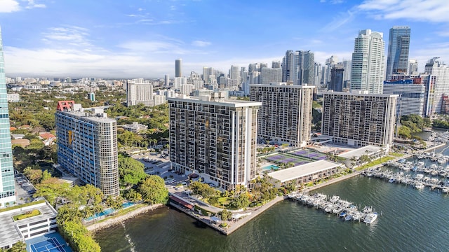 bird's eye view featuring a view of city and a water view