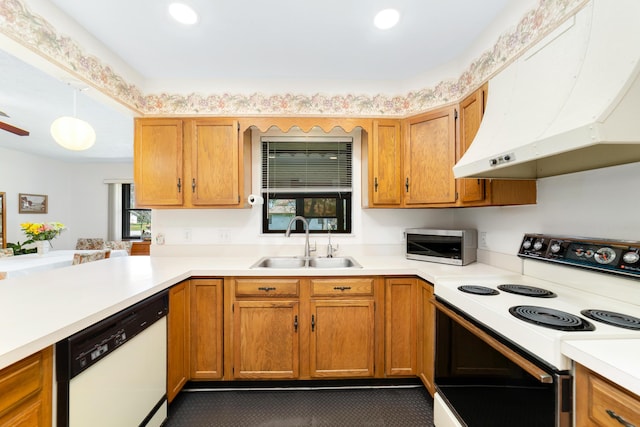 kitchen featuring ventilation hood, dishwasher, light countertops, electric range, and a sink