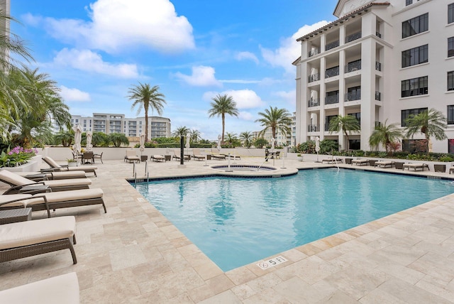 community pool with a patio