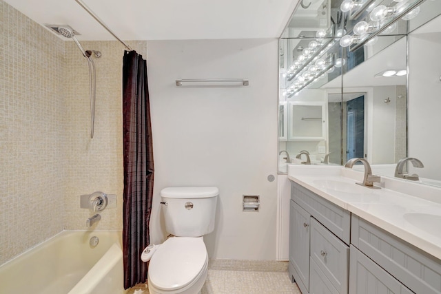 bathroom featuring shower / tub combo, toilet, and a sink