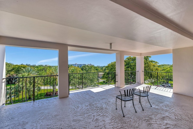 view of patio / terrace with a balcony