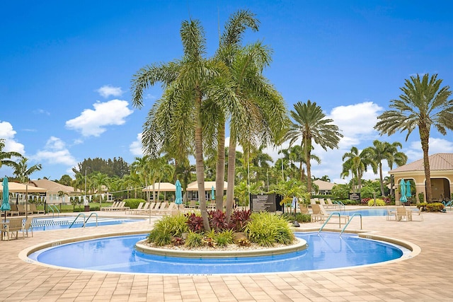 community pool featuring a patio