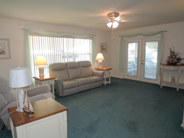 living room featuring carpet flooring, french doors, and ceiling fan