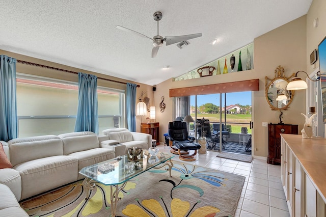 6089 Bay Isles Dr, Boynton Beach, FL 33437 - living area featuring light tile patterned floors, a ceiling fan, visible vents, high vaulted ceiling, and a textured ceiling