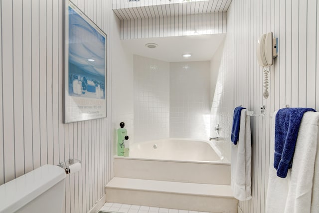 bathroom with toilet and shower / bathtub combination